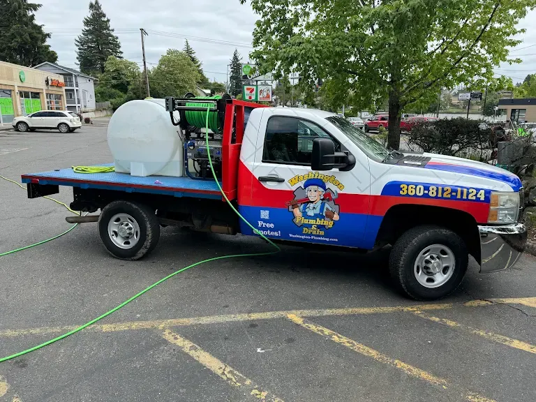 Washington Plumbing & Drain hydro jetting truck with water tank and jetter hose reel parked in Port Orchard — Hydro Jetting for Fircrest homes
